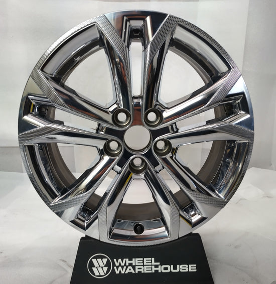used Toyota Sienna 18-inch chrome clad split-spoke OEM wheel with five lug holes and visible rim blemishes