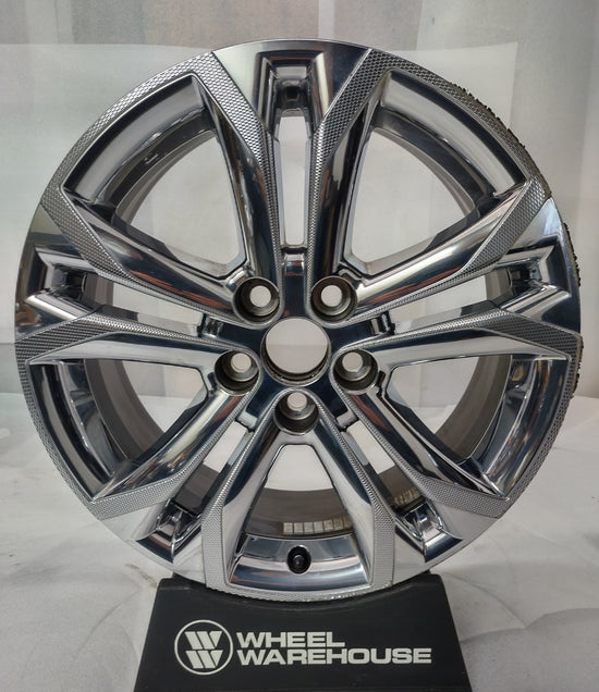 used Toyota Sienna 18-inch chrome clad split-spoke OEM wheel with five lug holes and visible rim blemishes