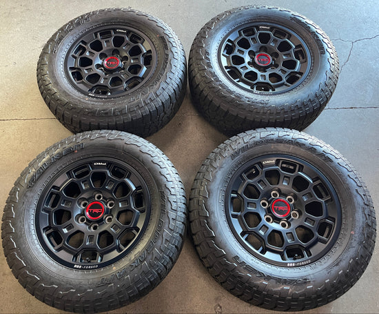 2022-2026 Toyota Tundra TRD BBS forged OEM 18x7.5 Semi Gloss Black Wheel Rim Tire Set of 4, OEM PT960342202F, interchange 69195, Falken WildPeak AT3WA 285/65R18 116T tires with approximately 99% tread, center caps included
