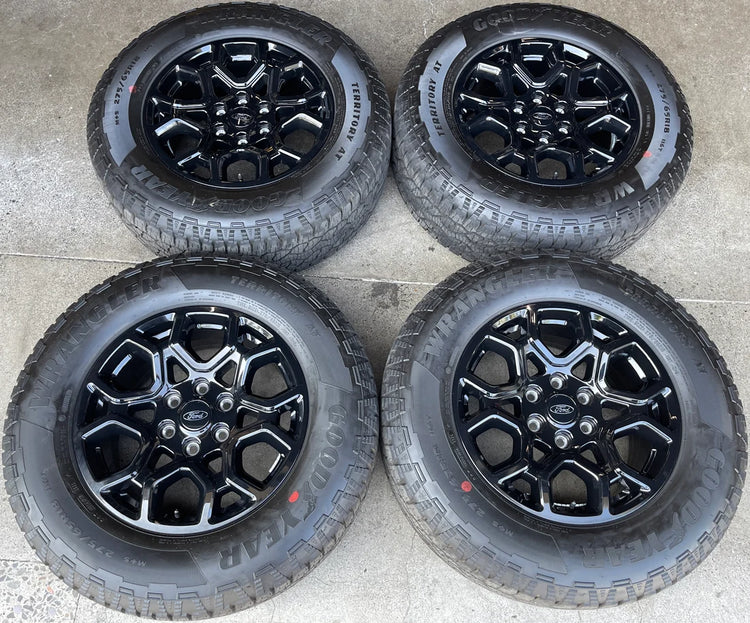 2025–2026 Ford F-150 18x8.5 Gloss Black OEM Wheel Rim Tire Set of 4, Goodyear Wrangler Territory A/T 275/65R18, OEM Part ML341007BA, Interchange 10340
