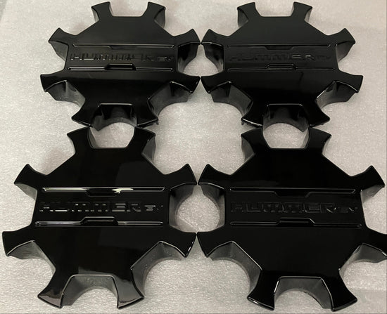 Four 2023-2025 Hummer EV Black center caps for 18" OEM wheels rim 84806055