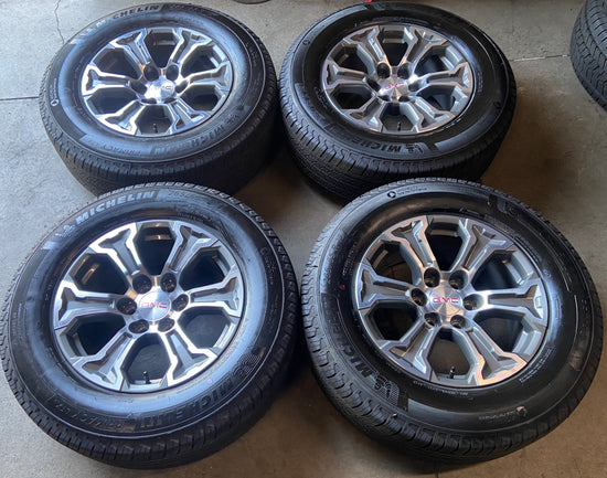 2019-2026 GMC Sierra 1500 Factory OEM 18" Machined with Charcoal Windows Wheel Rim Tire Set of 4 | 23377013
