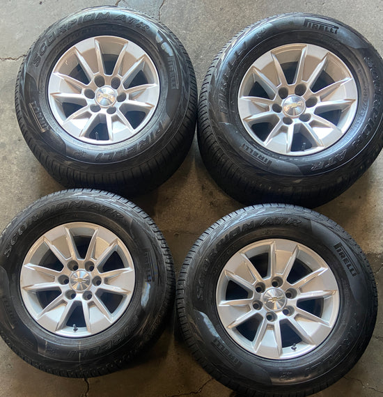 2019-2026 Chevy Silverado 1500 GMC Sierra 1500 17" Silver Wheel/Rim Tire Set 17x8 w/ Pirelli Scorpion ATR 265/70R17 — Used Wheels / Take-Off Tires