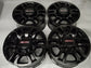 Four GMC Sierra 2500 OEM 18-inch gloss black wheels with GMC center caps, without tires.