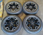 Four Ford Bronco Sport OEM 18-inch machined and gloss black wheels with Michelin tires and Bronco center caps.