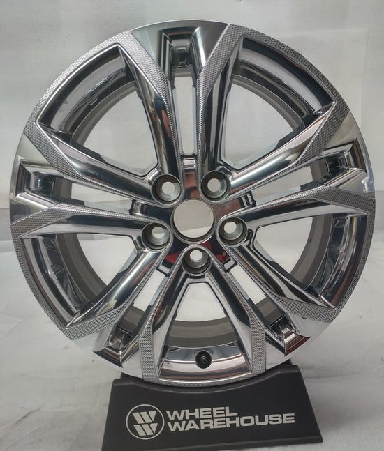 Single Toyota Sienna OEM 18-inch chrome clad wheel with five split spokes, shown without a center cap or tire.