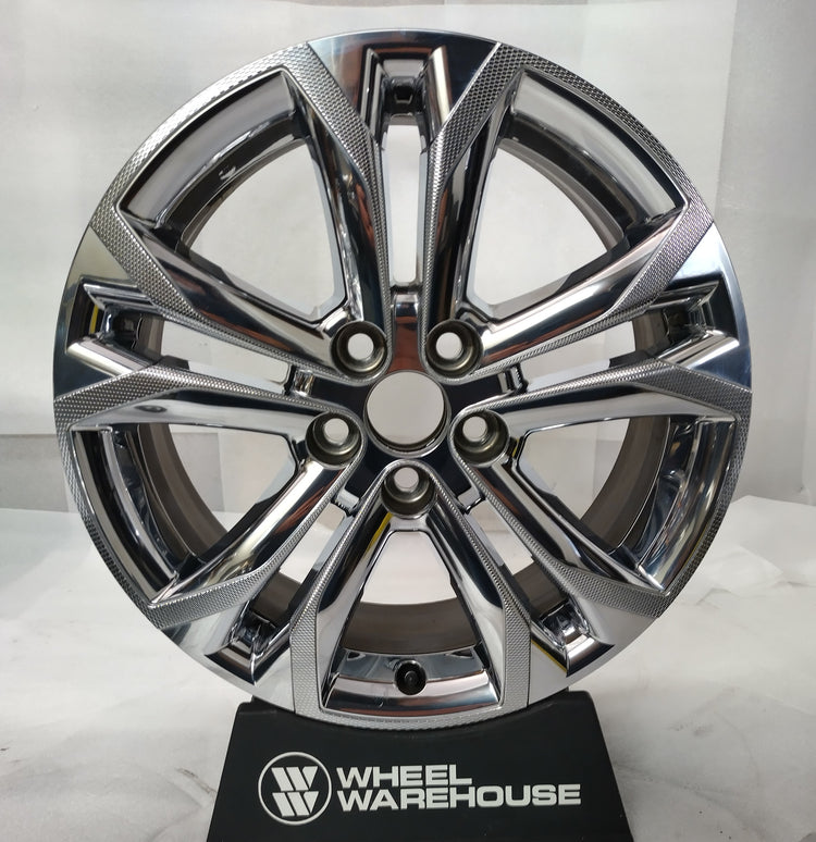 used Toyota Sienna 18-inch chrome clad split-spoke OEM wheel with five lug holes and visible rim blemishes