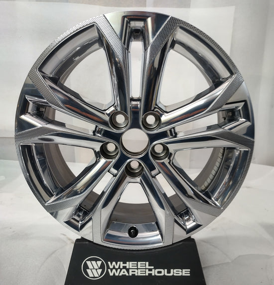 used Toyota Sienna 18-inch chrome clad split-spoke OEM wheel with five lug holes and visible rim blemishes
