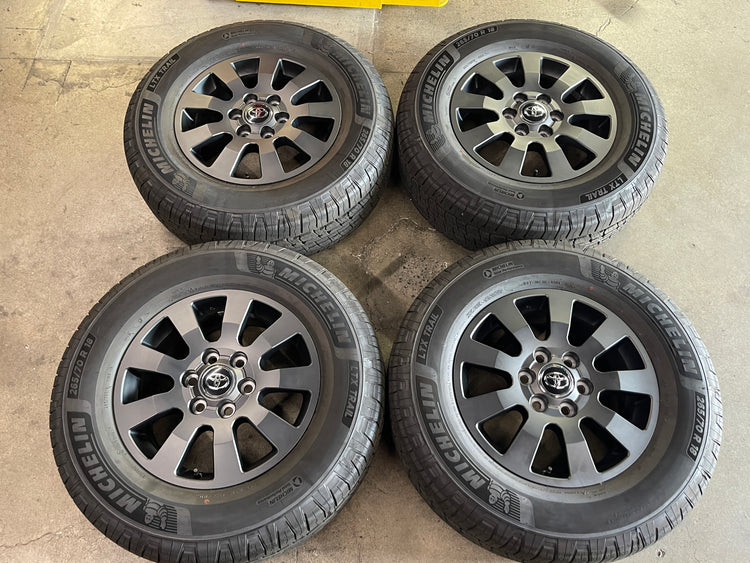2024-2026 Toyota Land Cruiser 18 inch Satin Charcoal OEM Wheel Rim Tire Set of 4, 4261160M70, Interchange 75304, Michelin LTX Trail 265/70R18
