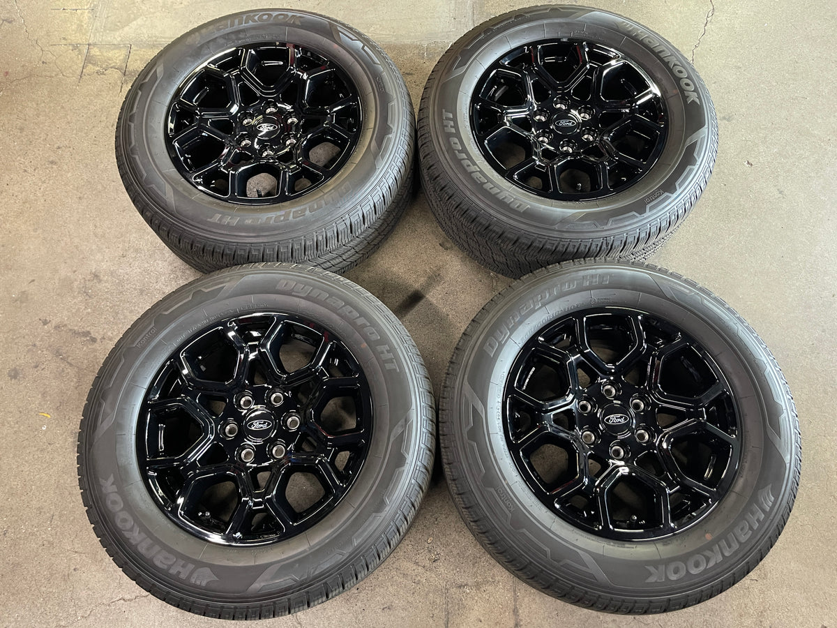 2024-2026 Ford F-150 OEM 18x8.5 Gloss Black Wheel/Rim Tire Set of 4 take-off, 6x135, OEM ML341007BA, interchange 10340, Hankook Dynapro H/T 265/60R18 110T, DOT 2925
