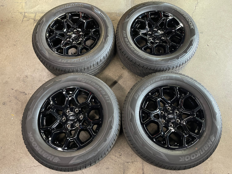 2024-2026 Ford F-150 OEM 18x8.5 Gloss Black Wheel/Rim Tire Set of 4 take-off, 6x135, OEM ML341007BA, interchange 10340, Hankook Dynapro H/T 265/60R18 110T, DOT 2925
