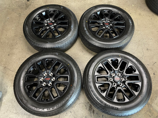 2022-2026 Toyota Tundra TRD OEM 20x8 Semi Gloss Black Wheel Rim Tire Set of 4 with Yokohama Geolander X-CV GO57 265/60R20 H-rated tires, OEM PT946-34220, interchange 75276