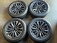 Set of four Mazda 19-inch Hyper Silver multi-spoke OEM wheels with Toyo Open Country H/T tires and Mazda center caps.