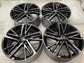 Set of four Toyota Camry XSE OEM wheels with gloss black pockets, machined spoke faces and Toyota center caps.
