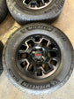 2024-2026 Toyota Tacoma TRD OEM 18" Satin Black Wheel/Rim Tire Set of 4 | PTR56-35240 Michelin Trail LTX