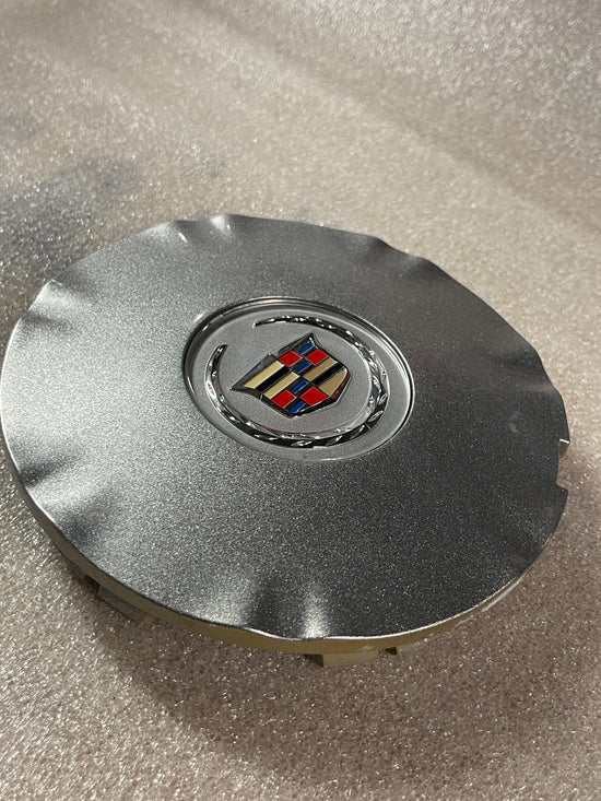 Single 2010-2016 Cadillac SRX OEM center cap GM PN 9599024