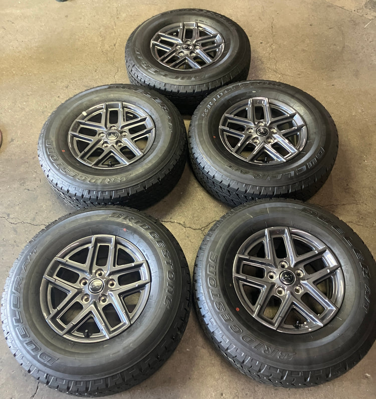 2025-2026 Jeep Wrangler Factory 17 Inch OEM Charcoal Wheel/Rim Tire Set of 5 Take-Off

