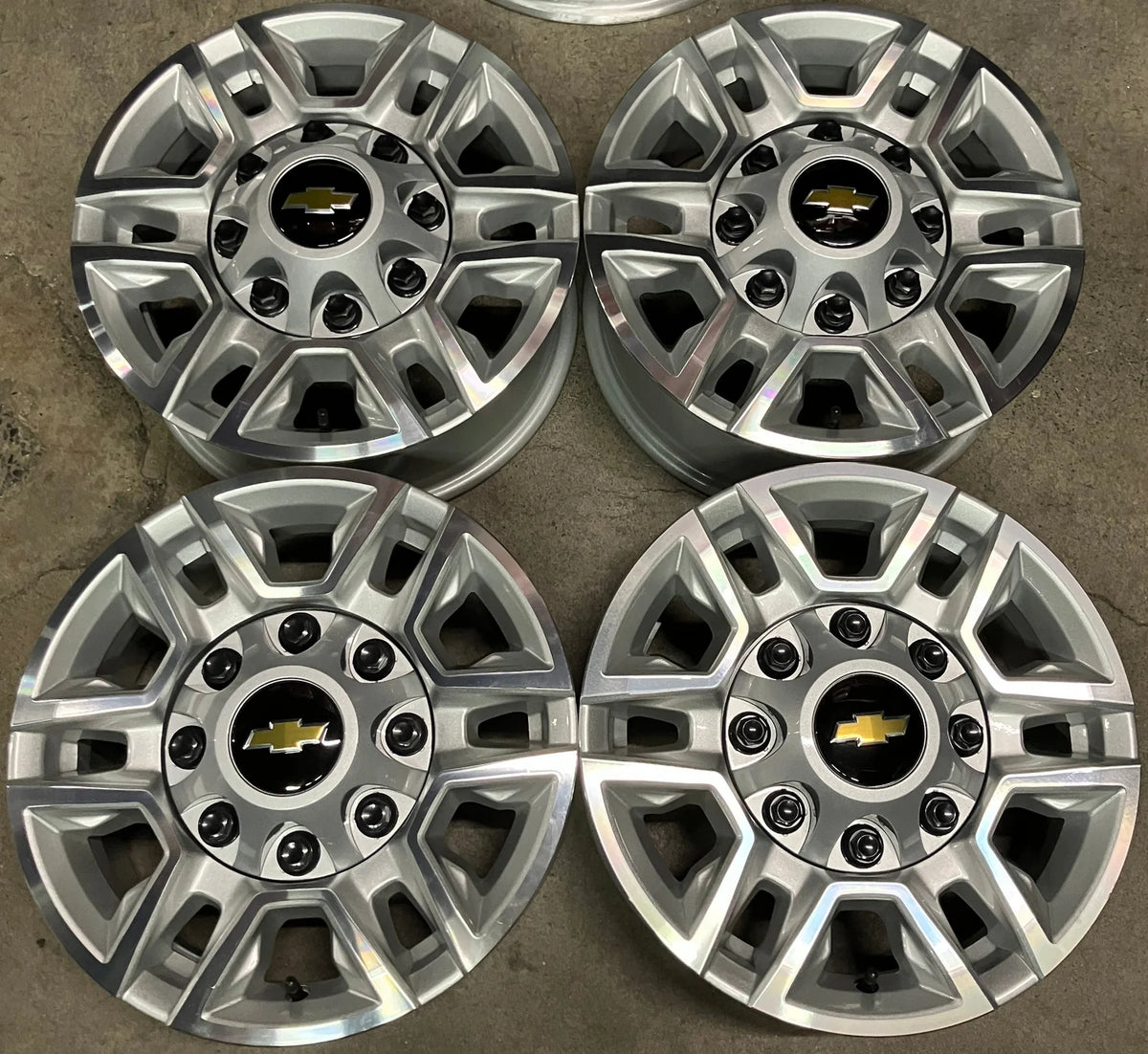 2020-2026 Chevrolet Silverado 2500HD OEM 17x7.5 Machined Silver Wheel Rim Set of 4, OEM part number 84742721, interchange 5948, 8x180 bolt pattern, four Chevrolet center caps included, take-off wheels only, no tires

