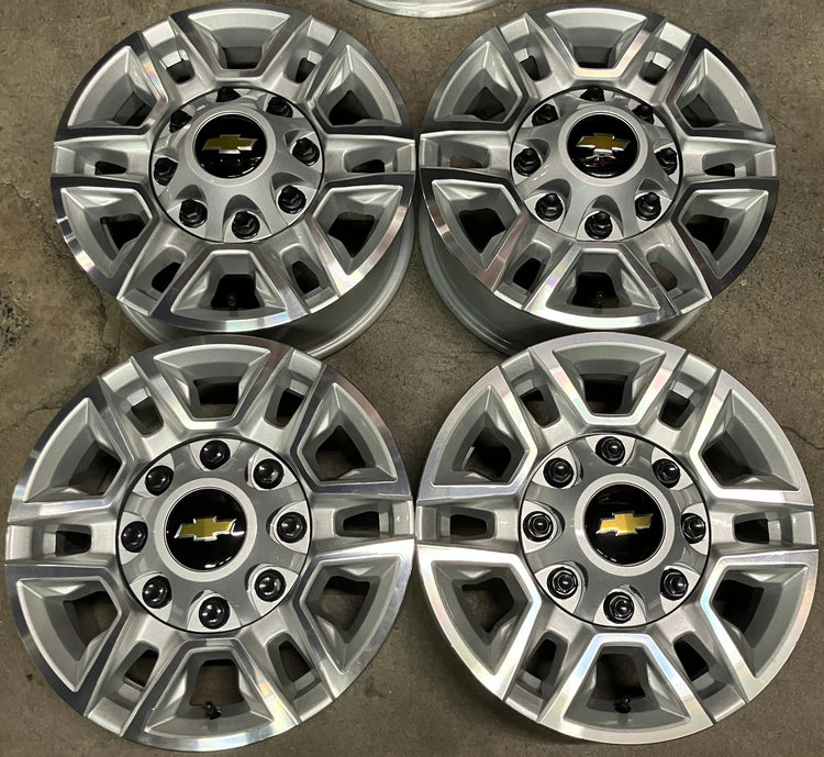 2020-2026 Chevrolet Silverado 2500HD OEM 17x7.5 Machined Silver Wheel Rim Set of 4, OEM part number 84742721, interchange 5948, 8x180 bolt pattern, four Chevrolet center caps included, take-off wheels only, no tires
