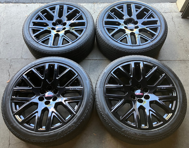 2025-2026 GMC Yukon Denali 24 Inch Gloss Black OEM Wheel Rim and Bridgestone Alenza A/S 02 Tire Set of 4, OEM 84949595, Interchange 08994
