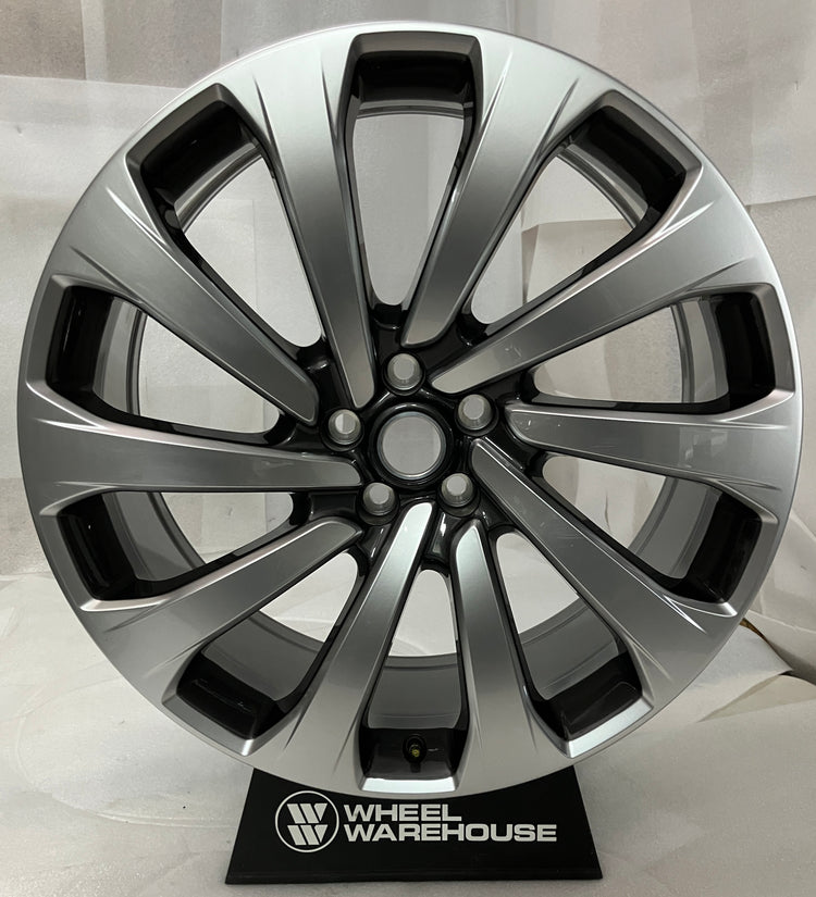 Land Rover Range Rover 23" OEM silver and charcoal multi-spoke wheel, front view without center cap